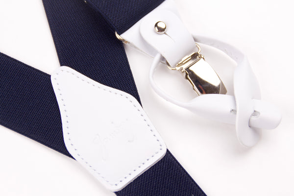 TIRANTES MARINO LISO ACABADOS EN PIEL BLANCA.